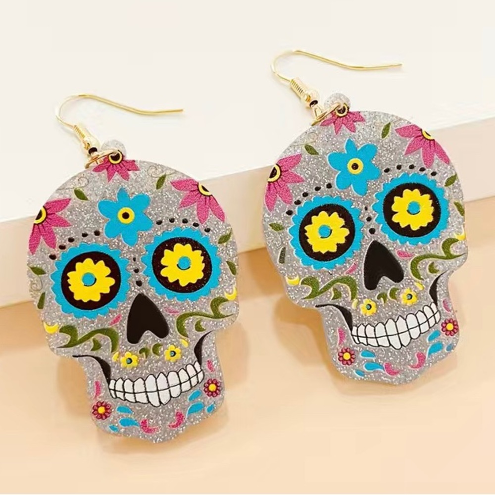 Skull earrings, silvery or gold